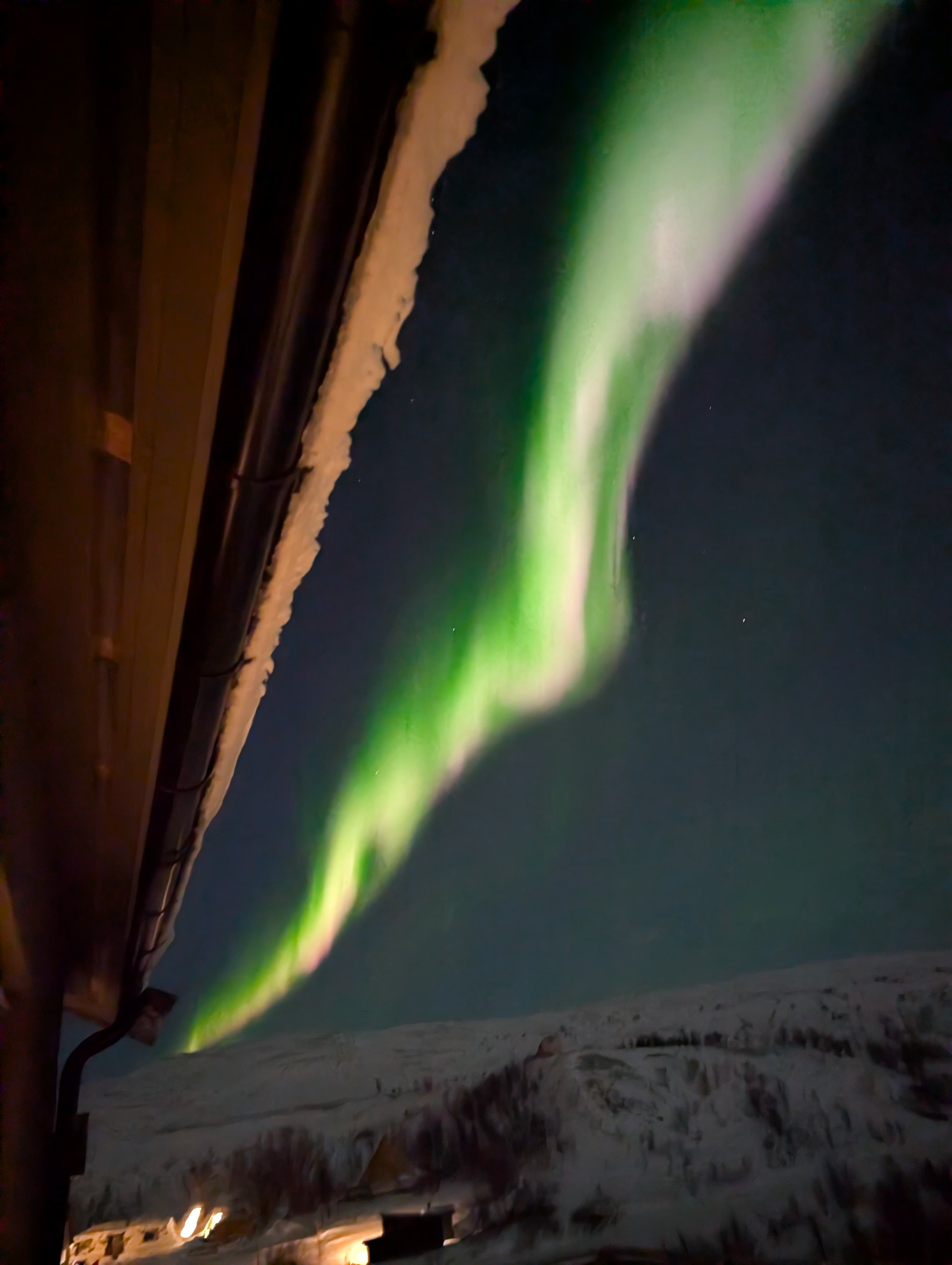 Polarlicht über dem Ferienhaus